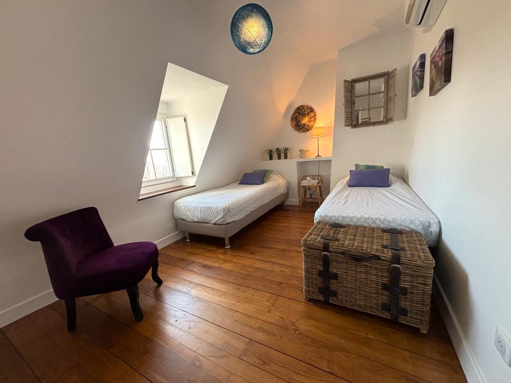 La seconde chambre avec 2 lits simples 