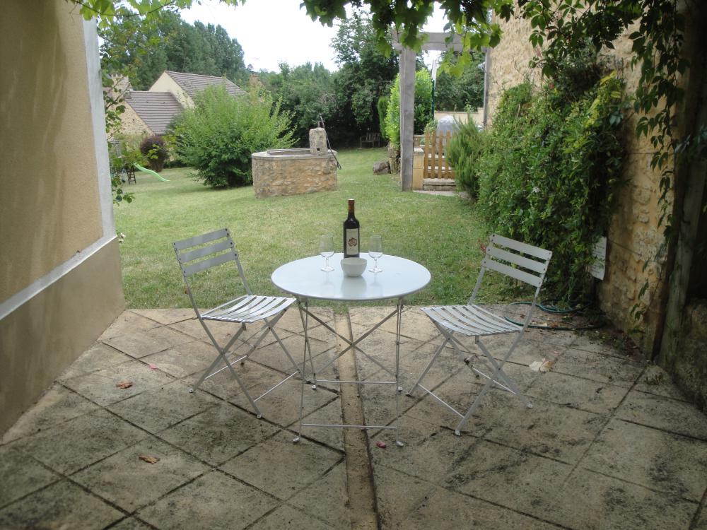 La terrasse couverte de vigne