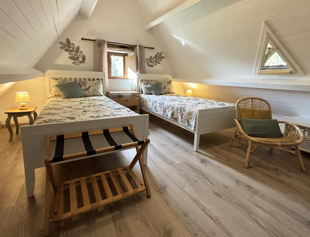 La seconde chambre avec deux lits simples 