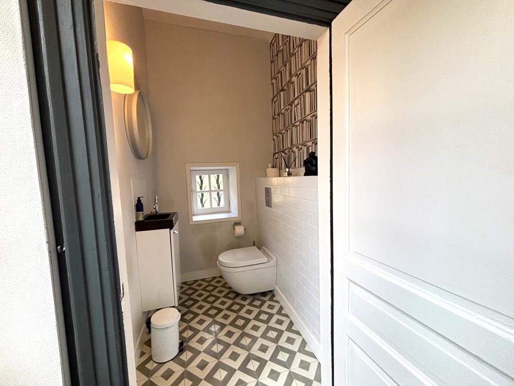 Les toilettes séparées en RDC